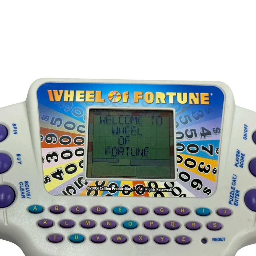 Hasbro Wheel of Fortune Handheld Electronic Game 2005 Retro Travel Toy 62841A